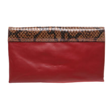 Load image into Gallery viewer, Back of clutch with ruby red leather and framed with snake skin look
