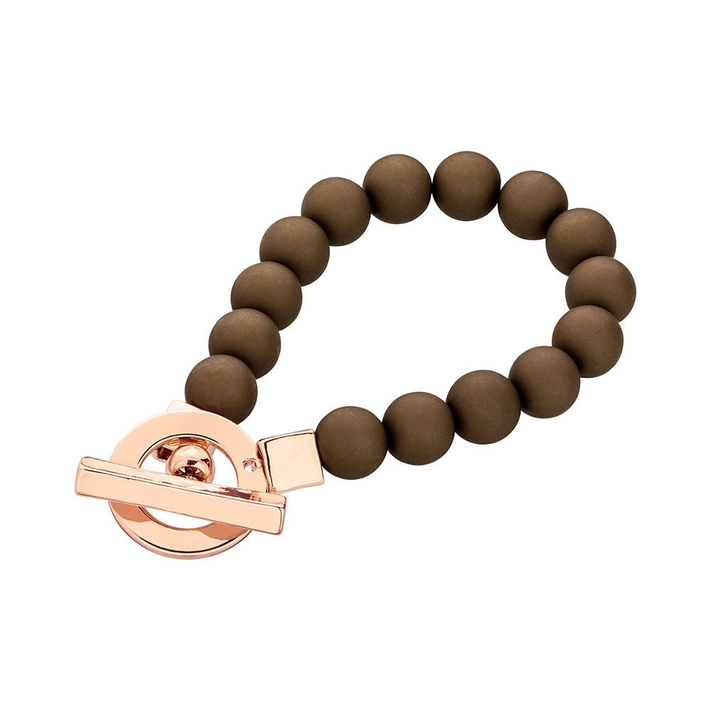 Fashion bracelet with T clasp and brown balls rose gold colour