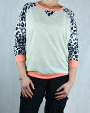 Load image into Gallery viewer, Parenza Chi Chi animal print sweater with peach colour trim on neck waist and wrist
